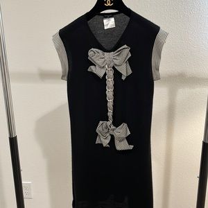 CHANEL knit tunic with bow and chain link details. Size 38 (fits like a small).